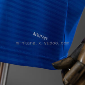 Camiseta Leeds United 2023/24 Visita - detalle escudo