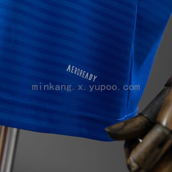 Camiseta Leeds United 2023/24 Visita - detalle escudo