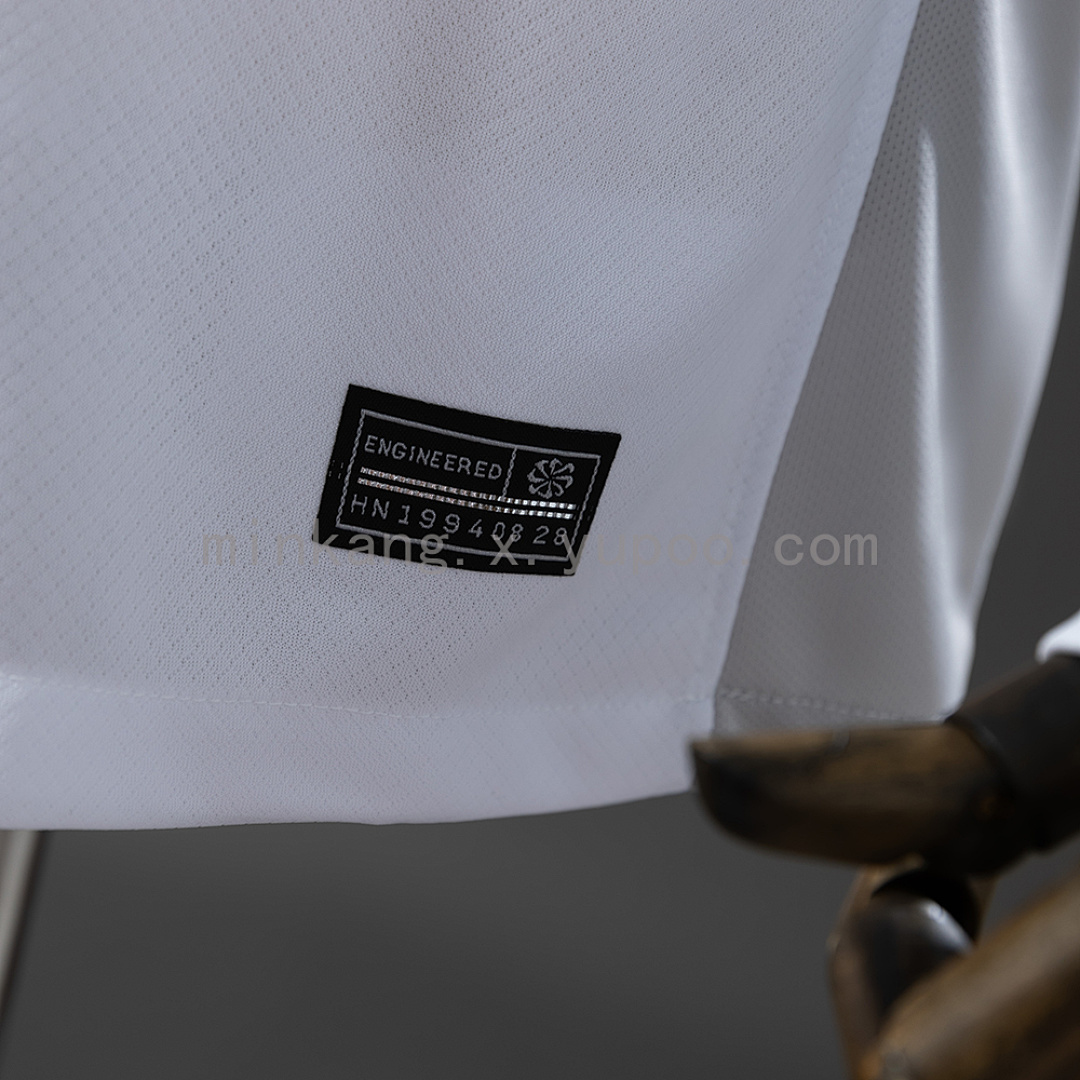 Camiseta Tottenham Hotspur 2023/24 Local Manga Larga - detalle escudo y marca