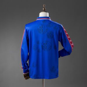 Camiseta Getafe C.F. 2023/24 Local Manga Larga — detalle franjas inferiores
