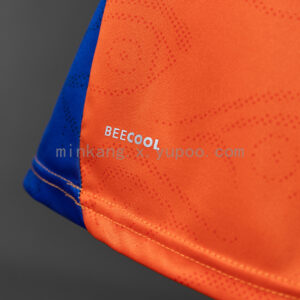 Camiseta Málaga CF 2023/24 Tercera — detalle escudo