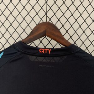Camiseta Manchester City 2023/24 Tercera - detalle escudo