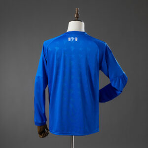 Camiseta Cruzeiro 2023/24 Local Manga Larga — detalle logo Adidas