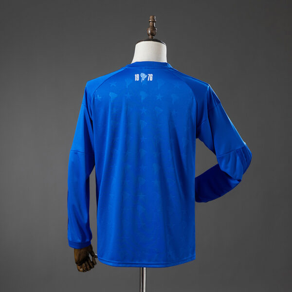 Camiseta Cruzeiro 2023/24 Local Manga Larga — detalle logo Adidas