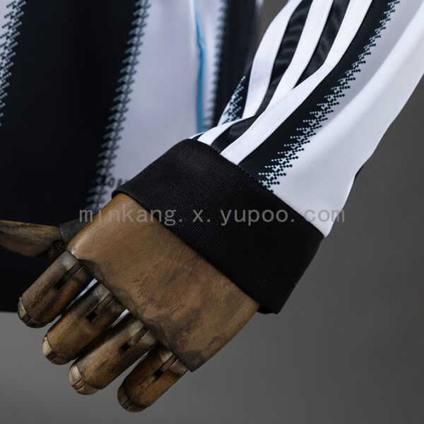 Camiseta Newcastle United 2023/24 Local Manga Larga - vista trasera