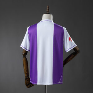 Camiseta Real Valladolid 2022/23 Local Edición Especial — detalle patrocinador Estrella Galicia