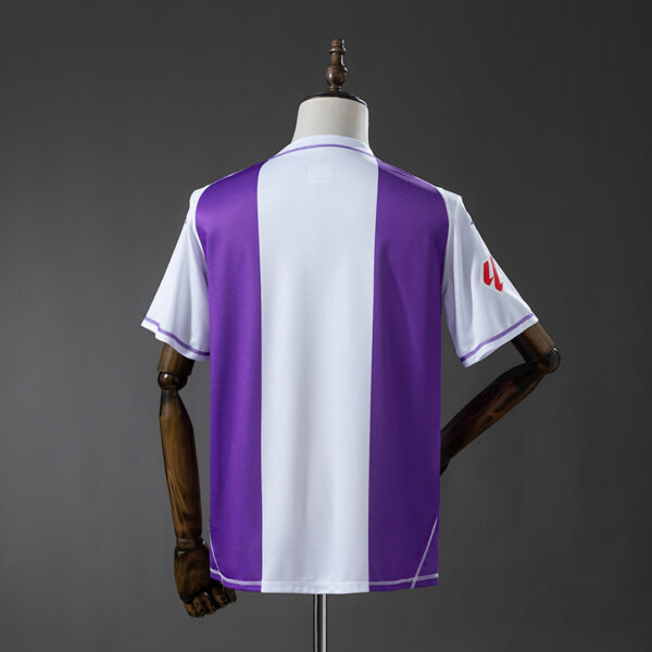 Camiseta Real Valladolid 2022/23 Local Edición Especial — detalle patrocinador Estrella Galicia