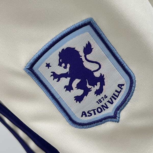 Camiseta Aston Villa 2023/24 Tercera - detalle escudo
