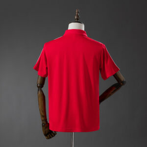 Camiseta Flamengo 2023/24 Polo — detalle logo Adidas Trefoil