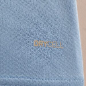 Camiseta Manchester City 2023/24 Local - detalle cintura y bajos