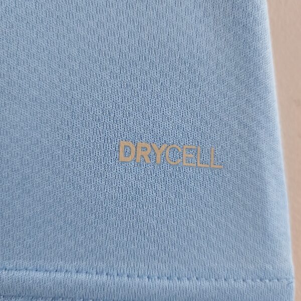 Camiseta Manchester City 2023/24 Local - detalle cintura y bajos