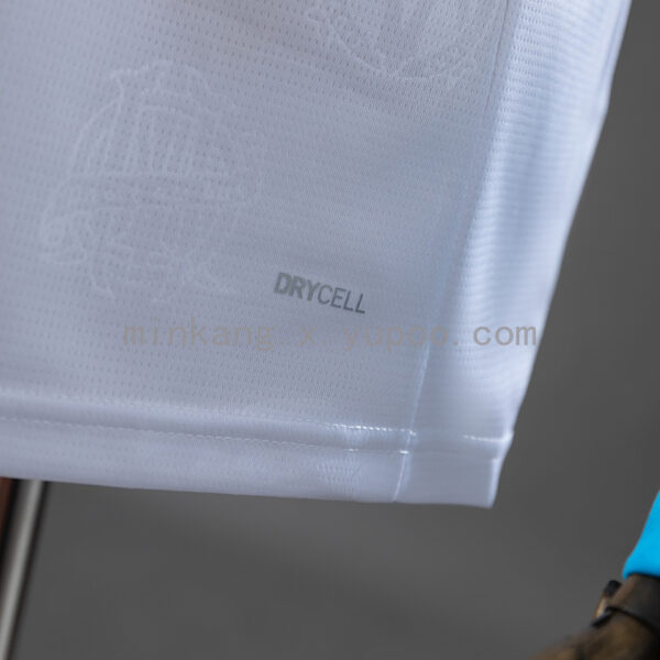 Camiseta Olympique de Marseille 2023/24 Local Manga Larga - detalle tela y textura