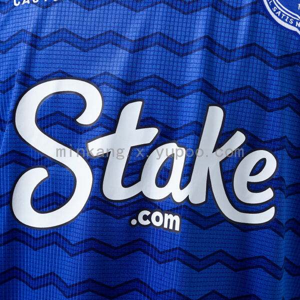 Camiseta Everton 2023/24 Local - detalle manga y logo Castore