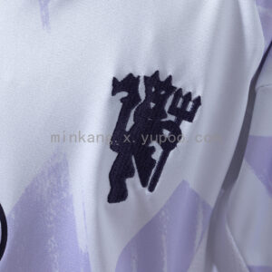 Camiseta Manchester United 2023/24 Visita Nino - detalle patrocinador de manga TECHH