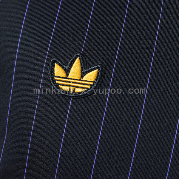 Camiseta Manchester United 1990 Retro Visitante - detalle emblema Diablo Rojo