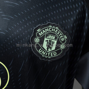 Camiseta Manchester United 2023/24 Entrenamiento Niño - detalle patrón de tejido