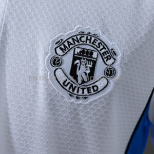 Camiseta Manchester United 2023/24 Polo - detalle hombro y las tres rayas