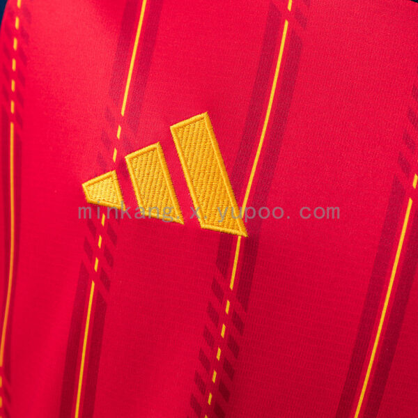 Camiseta España 2026 Local Stadium - detalle de tejido y patrón
