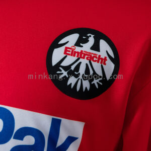 Camiseta Eintracht Frankfurt 2022/23 Local Manga Larga - detalle patrón diseño inferior