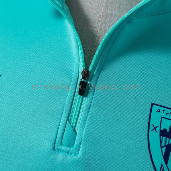 Camiseta Athletic Bilbao 2023/24 Entrenamiento Manga Larga — detalle parte inferior