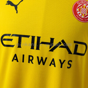 Camiseta Girona 2023/24 Visita — detalle etiqueta interna