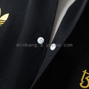 Camiseta Manchester United 2023/24 Chaqueta Adidas Originals Negra - detalle del tejido