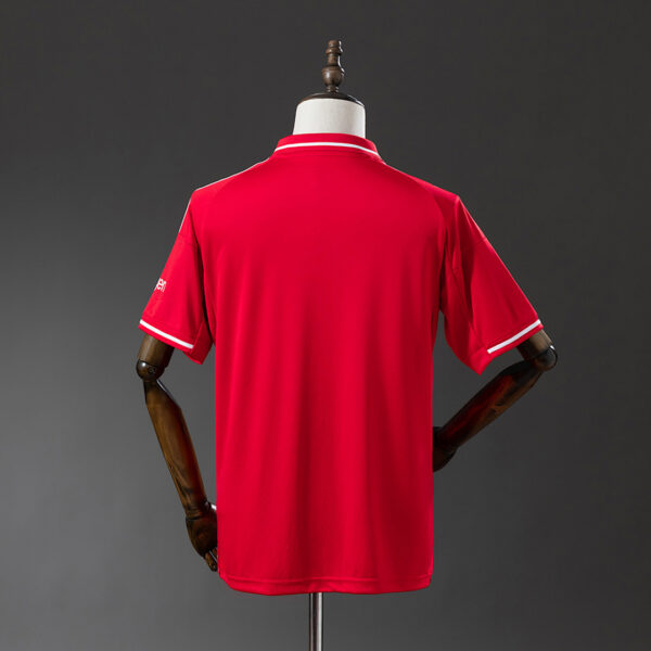 Camiseta Nottingham Forest 2023/24 Local Polo - textura del tejido y franjas
