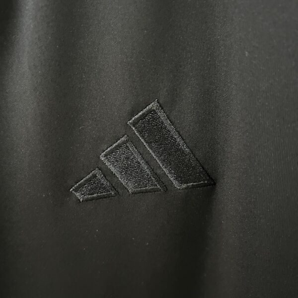 Camiseta Aston Villa 2023/24 Aniversario - detalle dobladillo