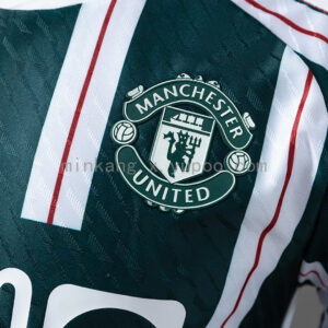 Camiseta Manchester United 2022/23 Visita - detalle costuras laterales