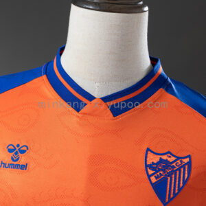 Camiseta Málaga CF 2023/24 Tercera — vista general con enfoque en texturas