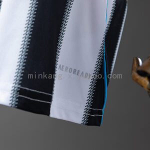 Camiseta Newcastle 2005/06 Retro Local - detalle dobladillo