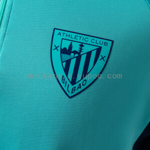 Camiseta Athletic Bilbao 2023/24 Entrenamiento Manga Larga — detalle logo Castore