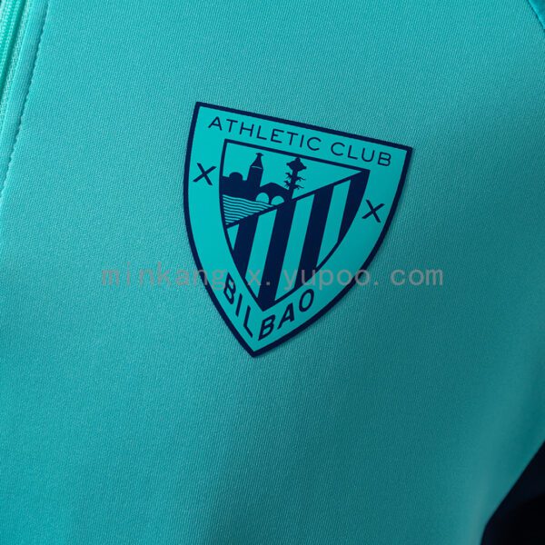Camiseta Athletic Bilbao 2023/24 Entrenamiento Manga Larga — detalle logo Castore