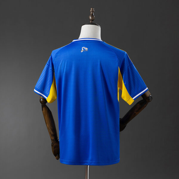 Camiseta Leeds United 2023/24 Visita - detalle del dobladillo