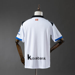 Camiseta Deportivo Alavés 2023/24 Visita — detalle dobladillo inferior