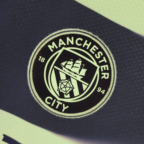Camiseta Manchester City 2023/24 Tercera - detalle de dobladillo