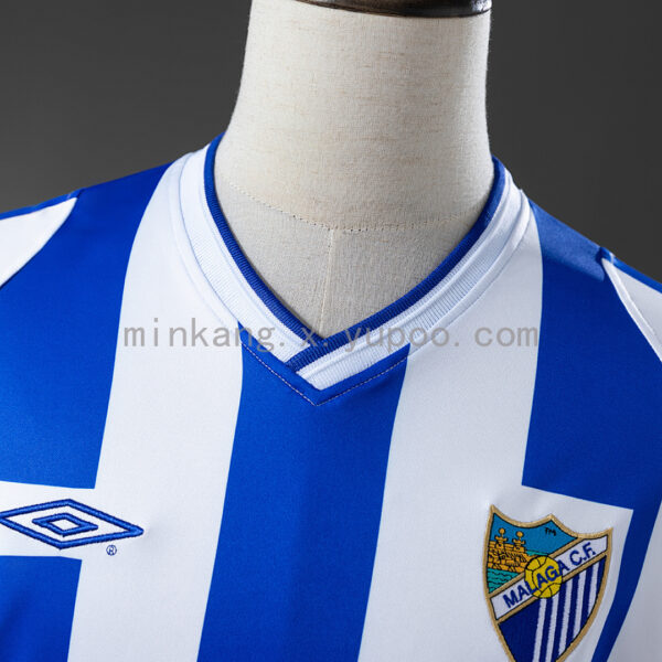 Camiseta Málaga CF 2017/18 Local — detalle escudo