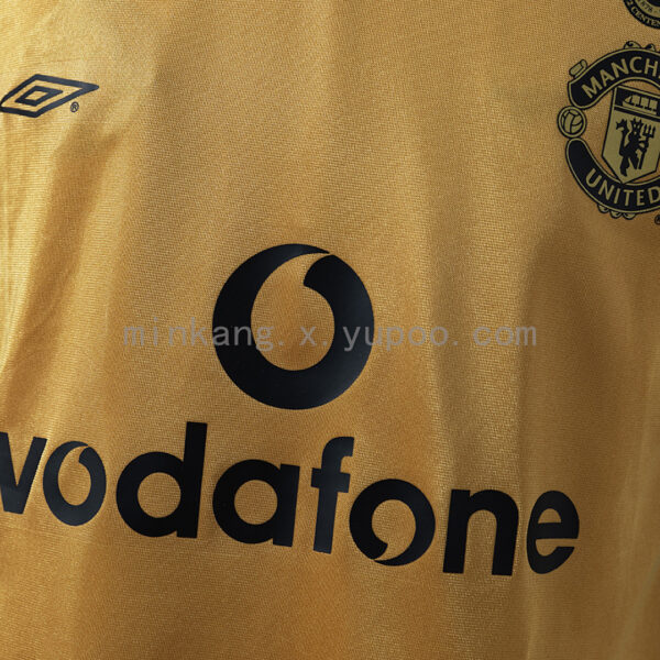 Camiseta Manchester United 2001/02 Retro Aniversario Manga Larga - detalle dobladillo inferior