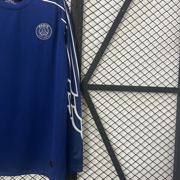 Camiseta Paris Saint-Germain 2023/24 Local Manga Larga - detalle escudo