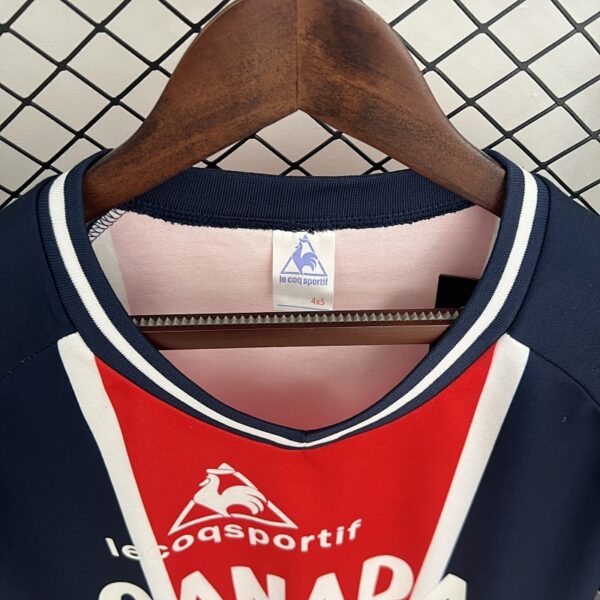 Camiseta París Saint-Germain 1974 Retro - detalle logo Le Coq Sportif