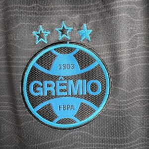 Camiseta Grêmio 2023/24 Tercera — camiseta color oscuro con toques claros