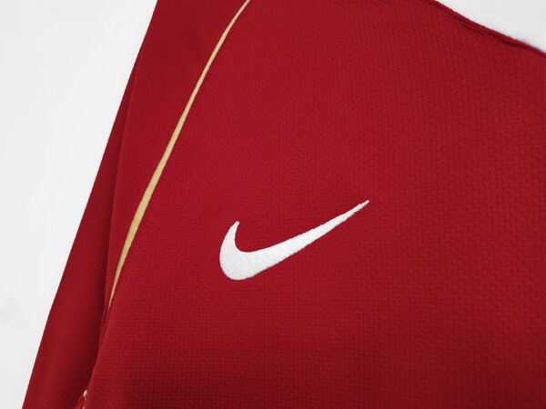 Camiseta Manchester United 1996-1997 Retro Local Manga Larga - detalle inferior derecho (manga y puño con etiqueta)