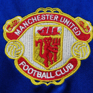 Camiseta Manchester United 1994/96 Visita - detalle manga y puño