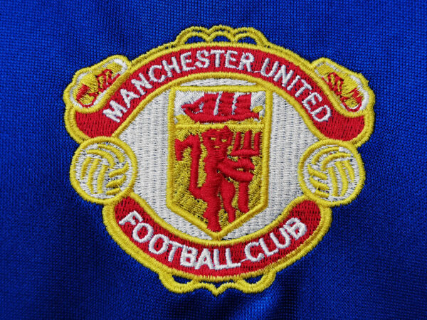 Camiseta Manchester United 1994/96 Visita - detalle manga y puño