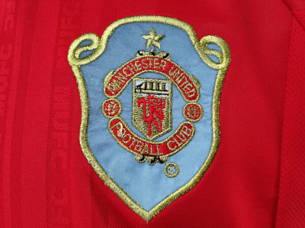 Camiseta Manchester United 1999 Retro Local - detalle