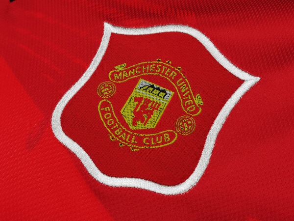 Camiseta Manchester United 1999 Retro Local Manga Larga - vista lateral
