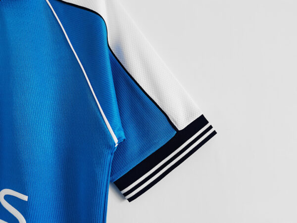 Camiseta Manchester City 2000 Retro Local - detalle marca Le Coq Sportif