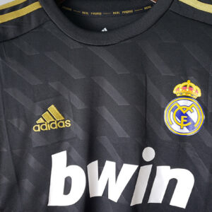 Camiseta Real Madrid 2010/11 Visita Manga Larga - vista inferior del dobladillo y ajuste