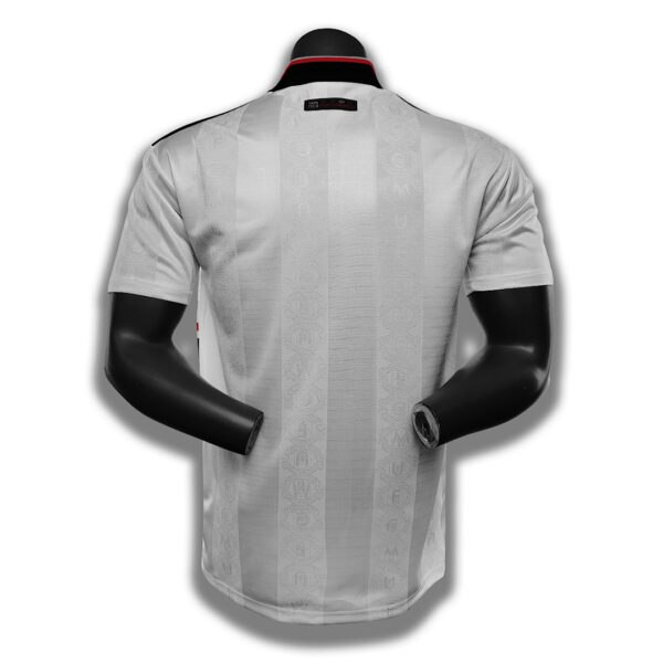 Camiseta Manchester United 1994/1996 Retro Local - detalle de rayas rojas y negras