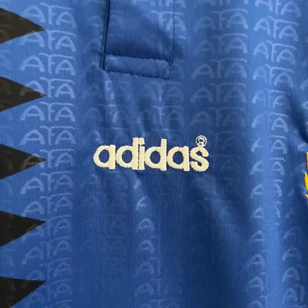 Camiseta Nino Argentina 1994 Retro Visita - detalle escudo